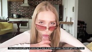 A pretty woman with glasses gets a cumshot on her face