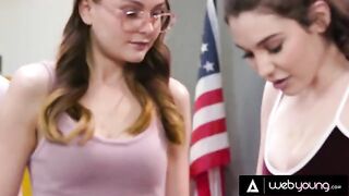 Two young girls experiment with their bodies during detention in a steamy video