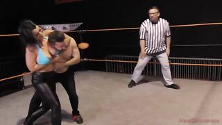 Nadia White, the busty brunette, dominates Glenn King in a fierce match