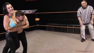 Nadia White, the busty brunette, dominates Glenn King in a fierce match