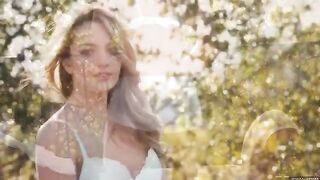A glamorous girl has a moment of nature and pleasure on camera