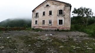 An exhibitionist girl is walking in abandoned buildings with her hot girlfriend