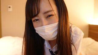 A Japanese school uniformed girl masturbates a guy’s cock with her hand