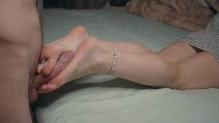 A petite girl is passionate about foot fetish, showcasing her sexy feet and legs
