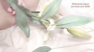 Bukkake while putting flowers in the ass of a shaved girl