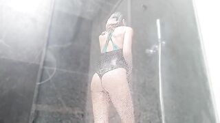 Sweet wet pussy masturbates to squirting orgasm in the shower, bringing intense pleasure