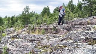 A hot chick is fucking on a stone in nature, it’s hot!