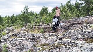 A hot chick is fucking on a stone in nature, it’s hot!