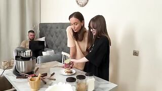 Two hot girls have a rest while cooking Russian syrniki