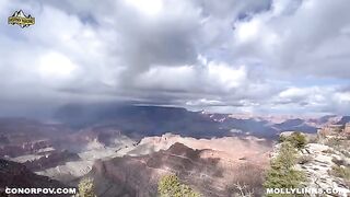 An amateur couple fucked outdoors on a cliff, captured in real POV style