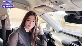 A girl got hooked on a car and started to make a mess of herself in public
