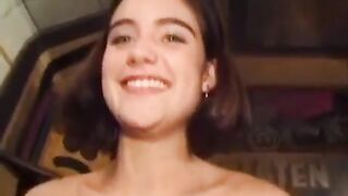 A hairy chick with small boobs masturbating her pussy in a steamy scene
