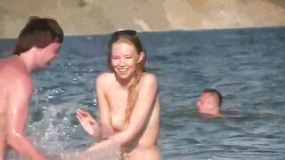 Nude beauties are fucking on the ocean shore