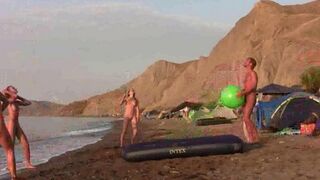 A badminton game played naked on the nudist beach is quite exciting