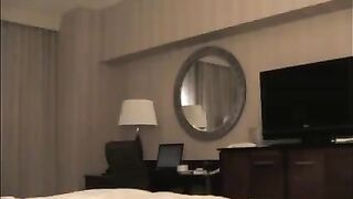 A whore was brought to the hotel room and started undressing
