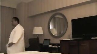 A whore was brought to the hotel room and started undressing