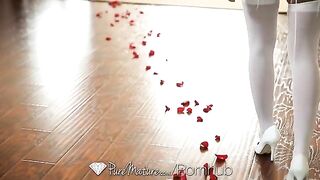 A young brunette has sex directly on the bed, showcasing her natural allure