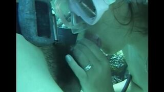 A guy has sex with a hairy girl with a nice ass in the water
