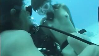 A guy has sex with a hairy girl with a nice ass in the water