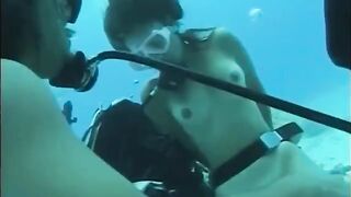 A guy has sex with a hairy girl with a nice ass in the water