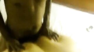 A fat woman lay on two guys with her huge body
