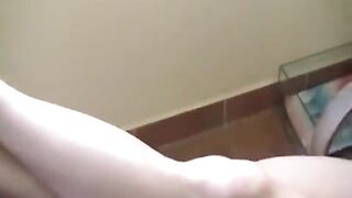 A girl smoked a naked cigarette on the sofa and burned herself