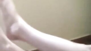 A girl smoked a naked cigarette on the sofa and burned herself