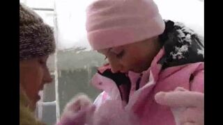 Beautiful girls are having fun without guys on a cold winter day