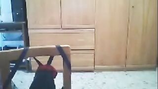 A girl has sex in front of her webcam while her husband is nearby