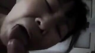 An old Chinese woman practices her blowjob skills with him