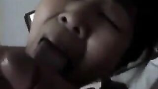 An old Chinese woman practices her blowjob skills with him