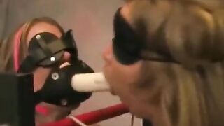 Two girls are having fun using sex toys and binding each other