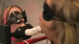 Two girls are having fun using sex toys and binding each other