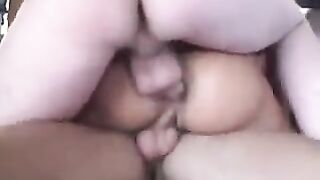 Two guys fuck her in the pussy and ass at the same time