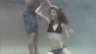 Redhead beauty making love with her partner in the swimming pool