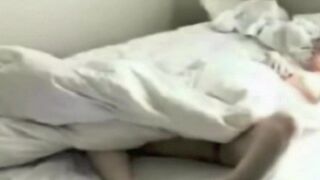 The girl caresses herself in front of a hidden camera