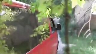 The man squeezed tits of girl by a car