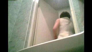A girl was peeing in the toilet and didn’t know there was a camera
