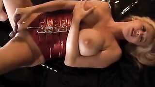 Busty blonde Rachel Aziani masturbates with a toy until she comes