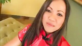 A Korean girl is working on her blowjob skills with two guys