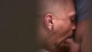 Two guys are jerking off each other in the public WC