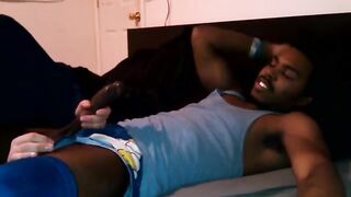 Blacks and whites are fucking on the bed in an intense scene