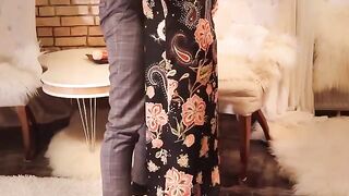 Redhead slut in long black dress, high heels and stockings gets fucked hard