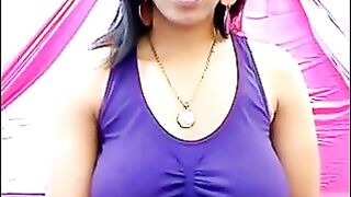The nipples of a excited brunette stick out through her T-shirt