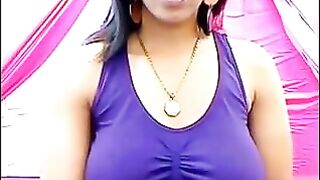 The nipples of a excited brunette stick out through her T-shirt