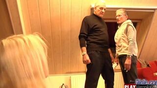 A young woman has sex with a bearded man with gray hair
