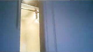 A wife is running around the apartment in a thong with soldiers