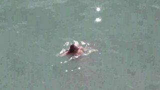A couple enjoying each other without any clothes on at sea