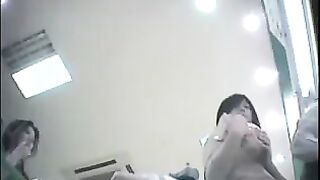 A hidden camera at the checkout shoots girls under their skirts in the store