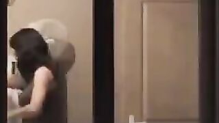 The guy admires himself in the mirror, not leaving anything unshown
